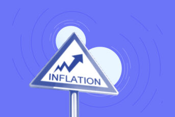 image of a road sign showing rising inflation