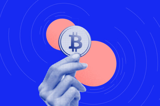 Hand holding Bitcoin